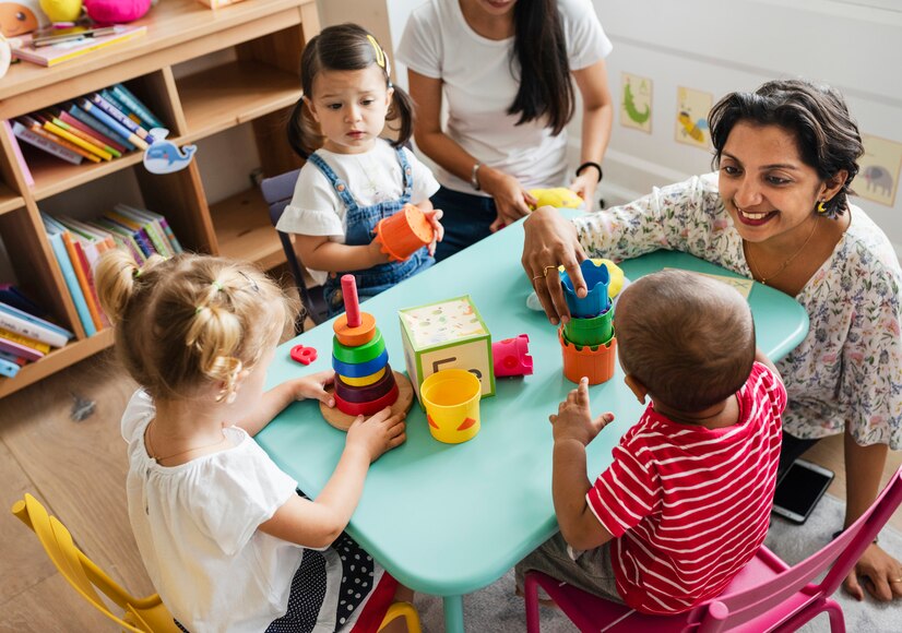 image-1007710-nursery-children-playing-with-teacher-classroom_53876-84223-8f14e.jpg